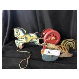 2 Early Wooden Pull Toys