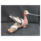 Painted Shorebird on Driftwood