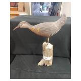 Painted Shorebird on Driftwood