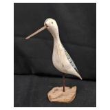 Painted Shorebird on Driftwood
