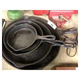 Four Cast Iron Skillets