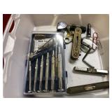 Brass Items and Magnifying Glass