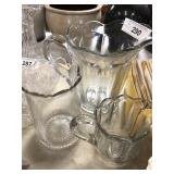 Selection of Two Glass Pitchers and a Celery Vase