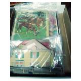 Assorted Puzzles and Cardboard Houses