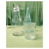 Three Embossed Glass Bottles