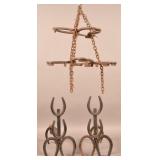 Pair of Horseshoe Andirons and Chandelier.