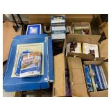 Skid of Textbooks and Children