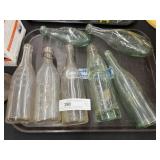 Assortment of Embossed Brewery Bottles