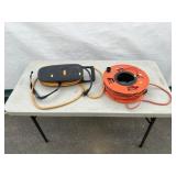 Electric Charging Cord and Extension Cord on Reel