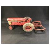 Farmall 560 Toy Tractor with Disc