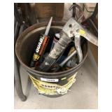 Bucket of Caulk with Caulk Gun