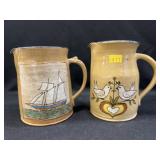 (2) Pieces of Left Hand Russell Henry Pitchers