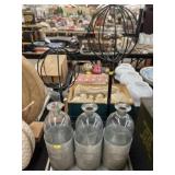 Circular Stands and Decorative Bottles