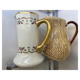 Limoge and Pottery Pitchers