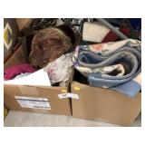 (2) Boxes of Table Linens, Rug, Wall Hanging