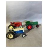Three Diecast Farm Tractor Models