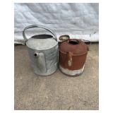 Galvanized and Rusted Metal Watering Cans