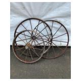 Three Rusted Metal Wagon Wheels