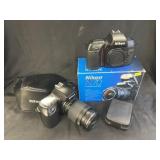 (2) Nikon 35mm Cameras