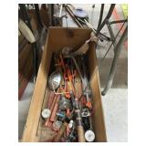 Assortment of Ice Fishing Rods and Supplies