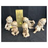 Grouping of Porcelain Kewpie Doll Figurines