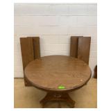 Round Wood Dining Table with Pedestal Base and Lea