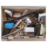 Cigar box of pins, pencils, razor, key chains, etc