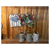 Three Metal Watering Cans and Wall Dï¿½cor