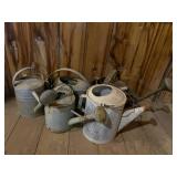 Five Metal Watering Cans