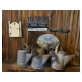 Three Metal Watering Cans & Wall Decor