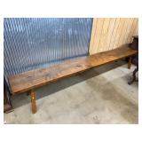 Long Wooden Bench With Four Legs