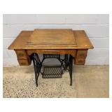 Singer Treadle Sewing Machine in Oak Cabinet