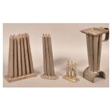 Four Various Tin Candle Molds.