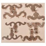 Four Pairs of Wrought Iron Rams Horn Hinges.