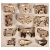 Twelve Various Antique Figural Tin Cookie Cutters.