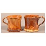 Two Rockingham Glazed Yellowware Mugs.