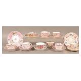 Eight Various Pink Lustre China Cups and Saucers.