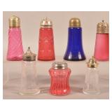 Seven Various Antique Glass Muffineers.