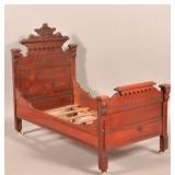 Eastlake Victorian Mixed Wood High-Back Doll Bed.