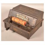 "The Gem Roller Organ" with 13 Rolls.