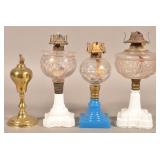 Four Various Antique Pedestal Fluid Lamps.