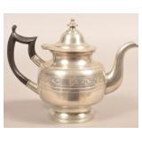 Eben Smith Pewter Bulbous Form Footed Teapot.