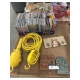 Box of Cds, Wall Hangings and Work Lights
