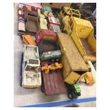 Half Table of Tonka, Hess and Tootsie Toys