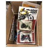 (7) Assorted 126th Scale Dirtbike Ridge Rider
