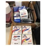 Box with Grease Guns and Oil Filters