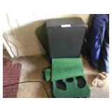 Putting Green, Golf Shoes, Books and Suitcase