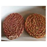 2 Colorful Braided Pads on Cardboard