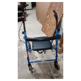 WALKER W/ SEAT..FOLDS UP