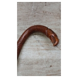 HAS EAGLE HEAD HANDLE